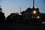 Train 107 races south in the growing darkness